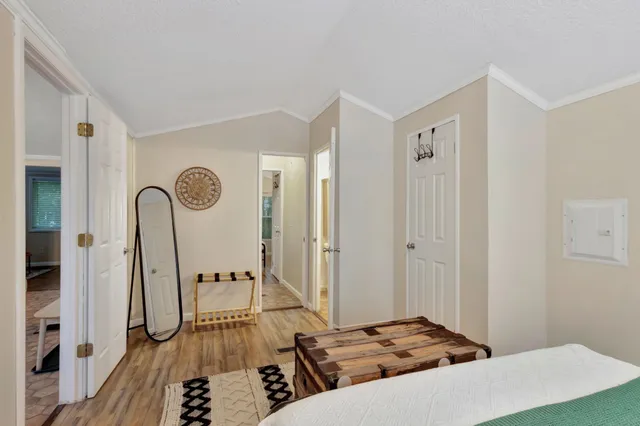 a view of a chairs and table in a blue umbrella