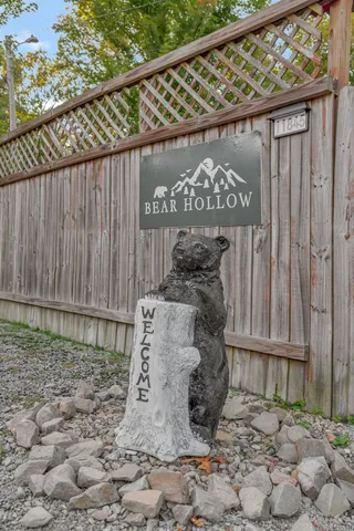 a porch with seating space and potted plant