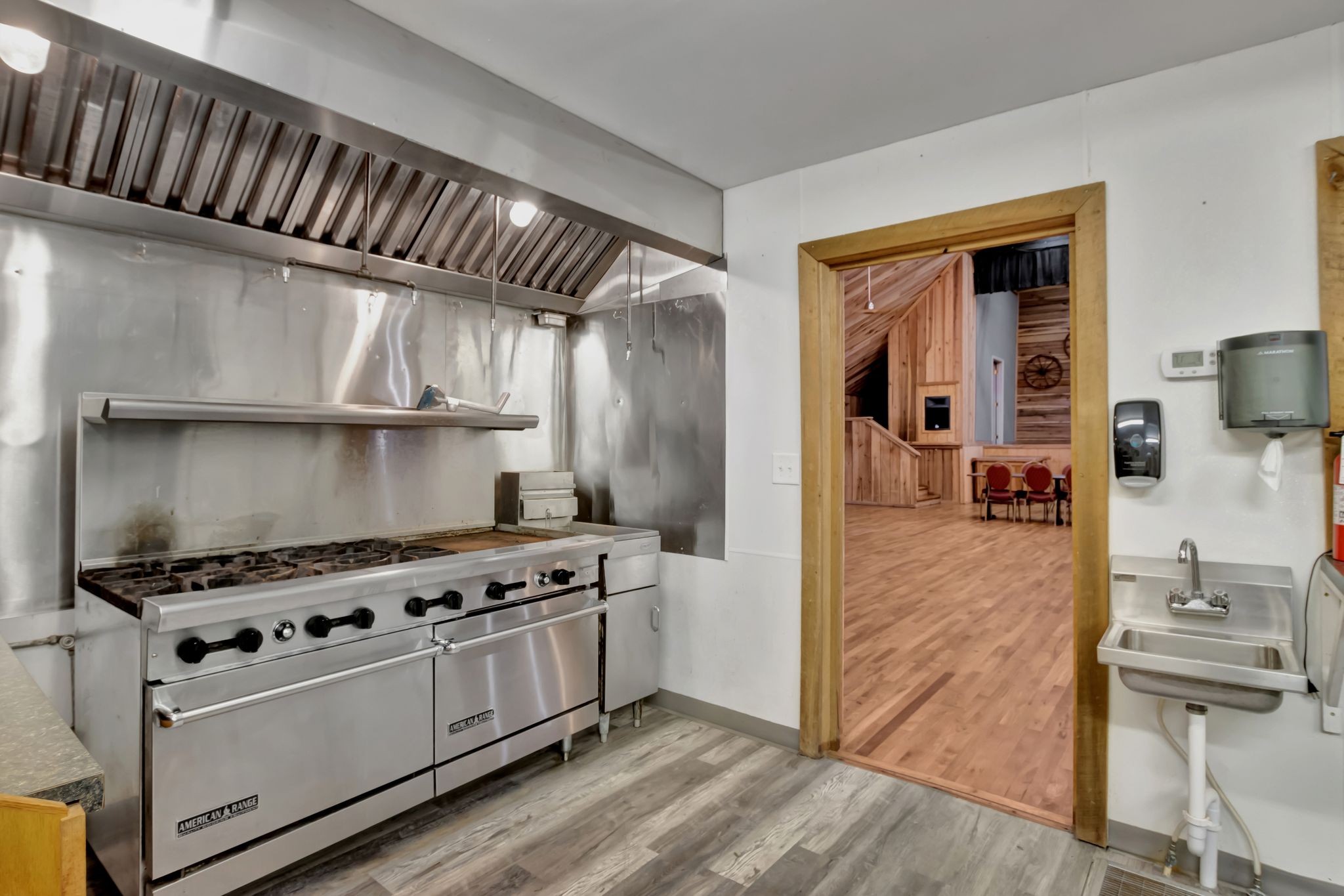 11845 Highway 41 Monteagle, TN 37356 - Photo 72 of 74 a kitchen with stainless steel appliances a stove and a refrigerator