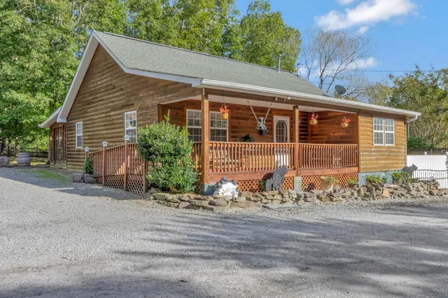 a kitchen with sink and refrigerator