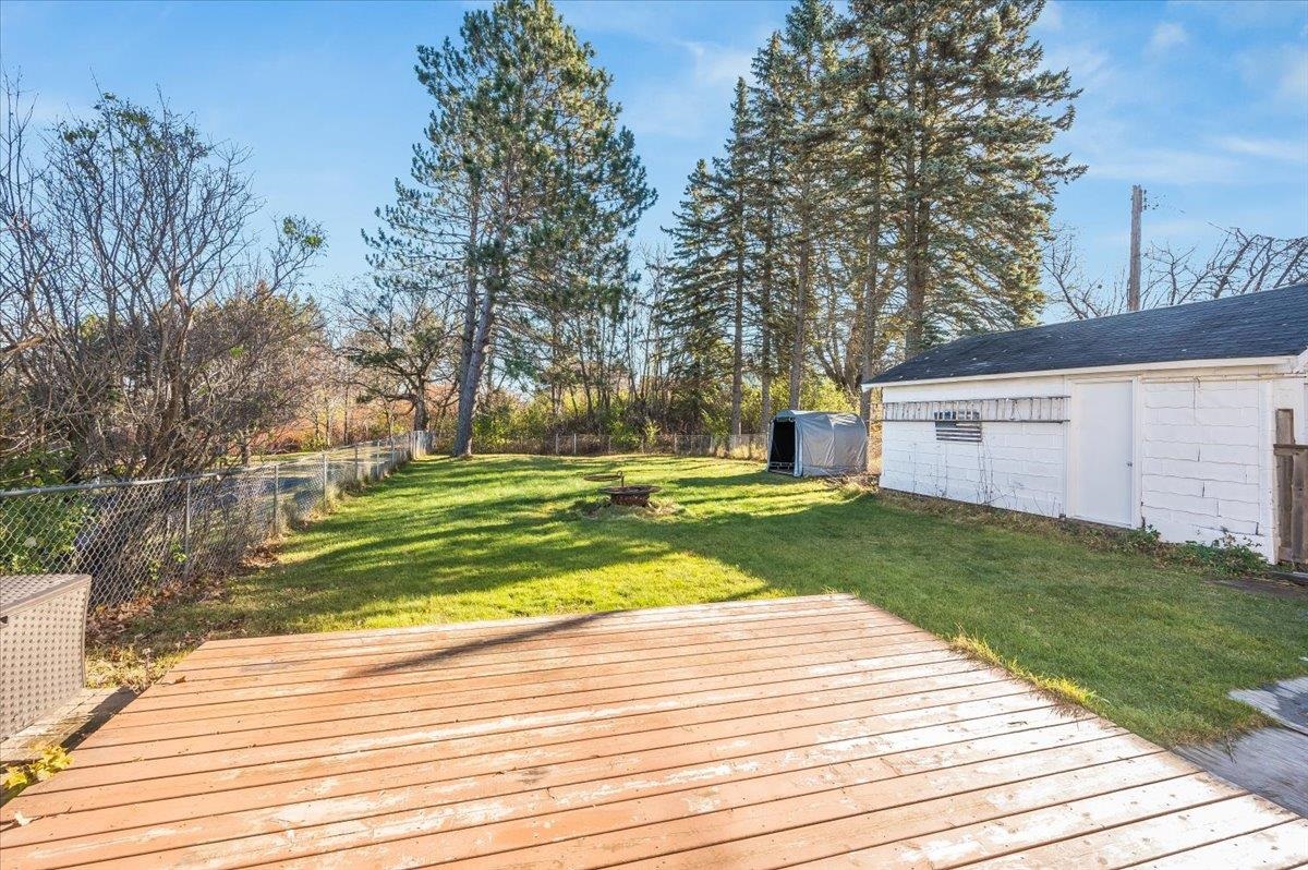 1906 Springvale Road Duluth, MN 55811 - Photo 5 of 15 Wooden terrace with a lawn