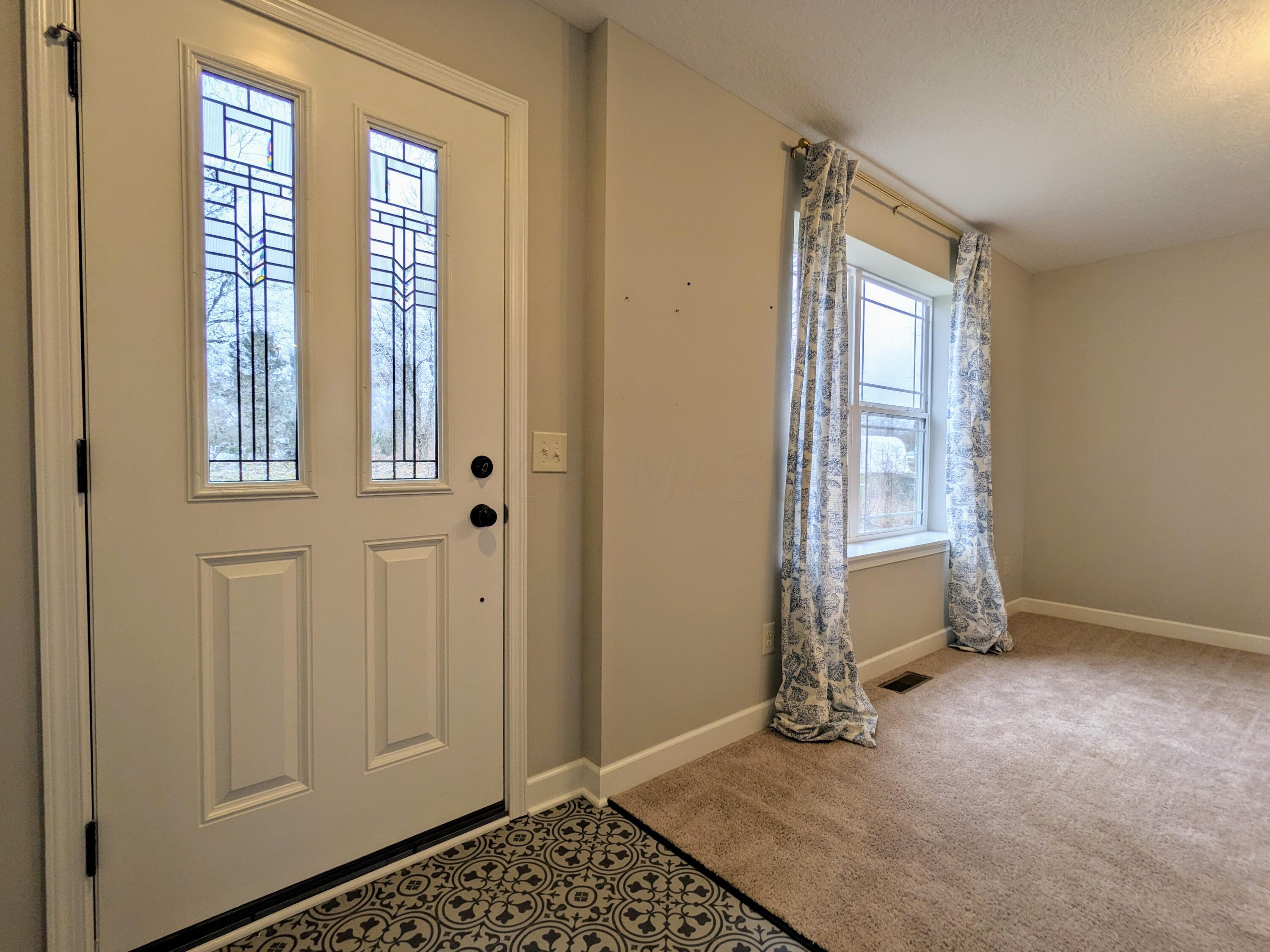 3233 South County Line Road Johnstown, OH 43031 - Photo 6 of 35 Welcome home to this nearly new home with all the feels.