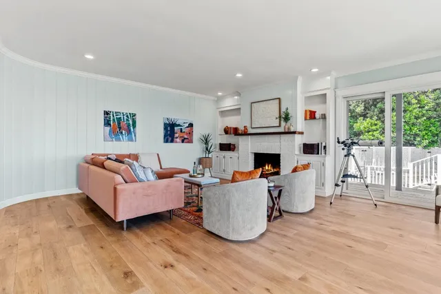 a view of a balcony with chairs