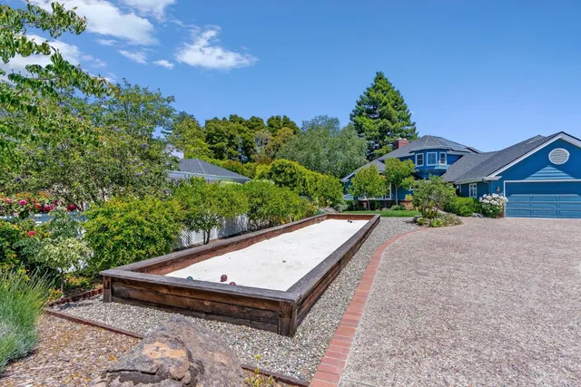 a view of a garden with a fountain