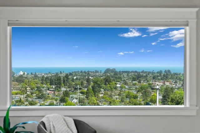 a living room with furniture and flat screen tv