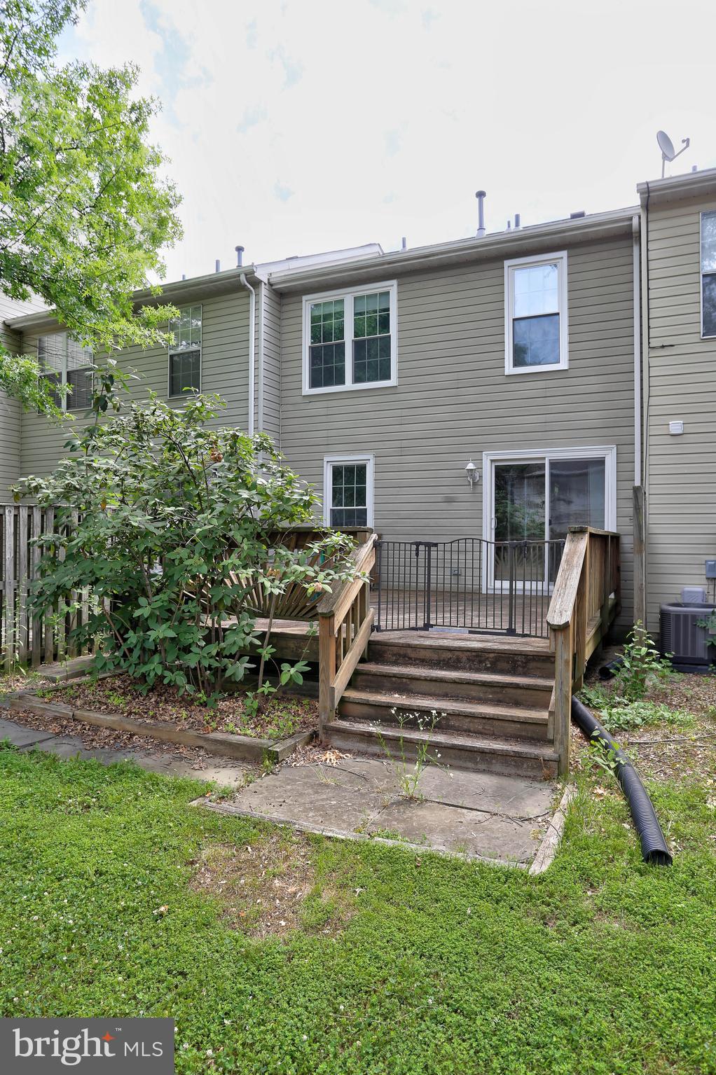 6136 Starburn Path Columbia, MD 21045 - Photo 28 of 35 a view of a house with backyard and sitting area