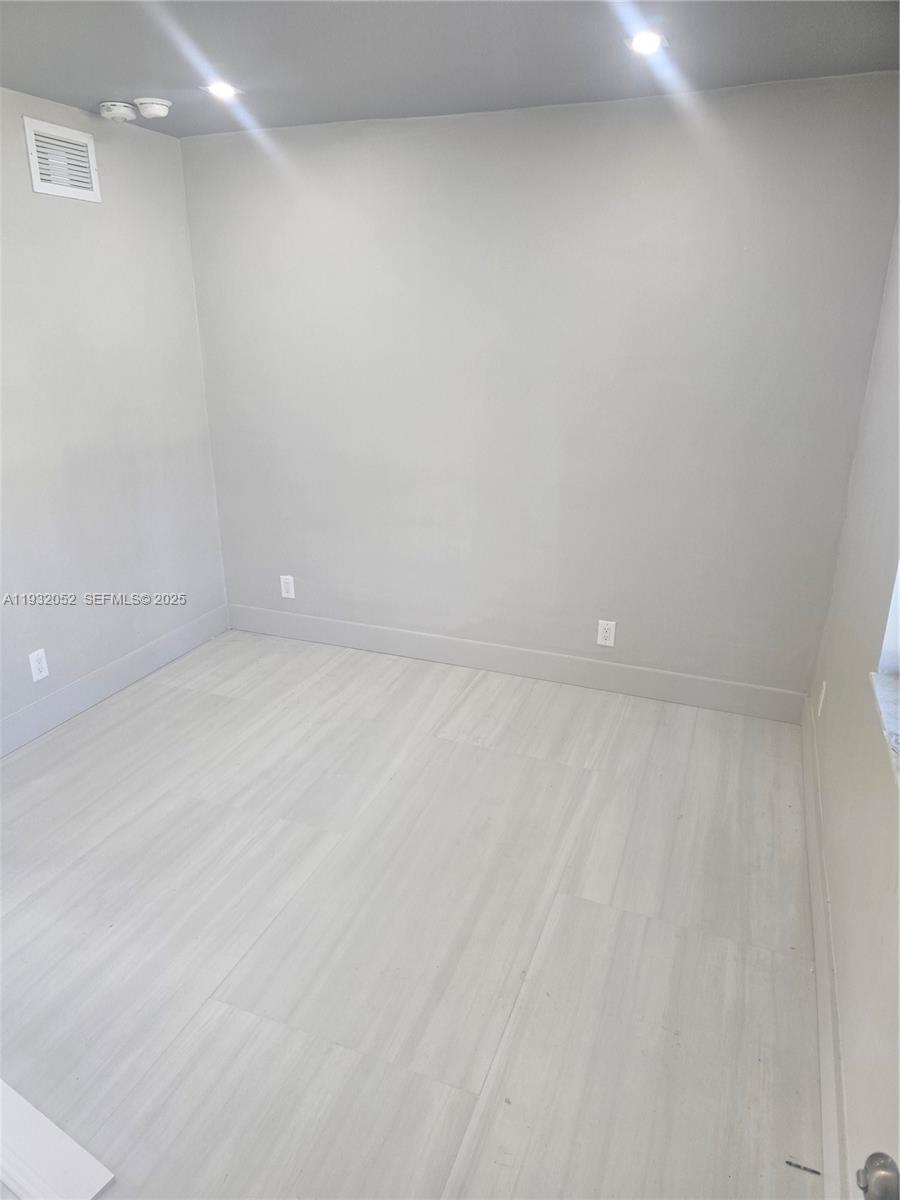 3300 Southeast 6th Street, Unit 6 Pompano Beach, FL 33062 - Photo 5 of 7 a view of an empty room