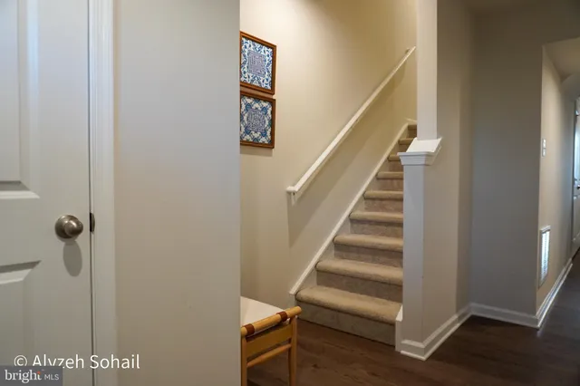 a view of entryway with wooden floor