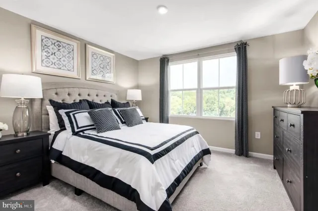 a bed room with a bed and a night stand