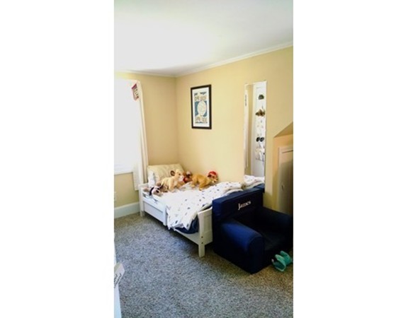 57 Sturbridge Road Holland, MA 01521 - Photo 13 of 18 a bed room with a bed and a window