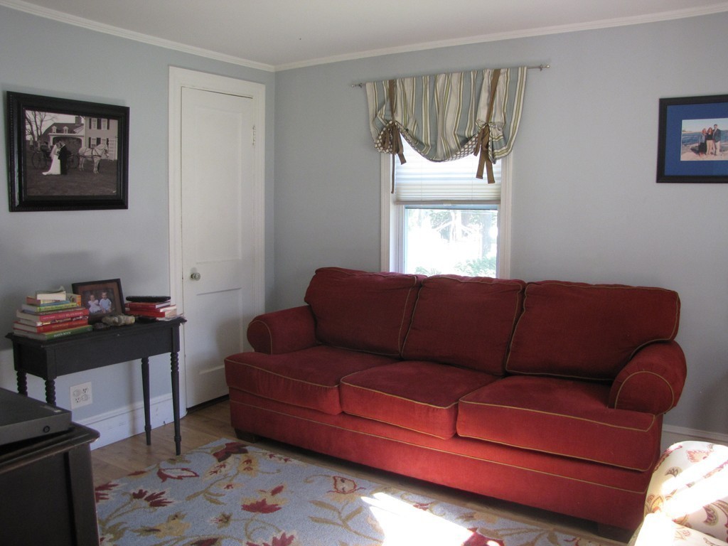 57 Sturbridge Road Holland, MA 01521 - Photo 8 of 18 a living room with a couch and a table