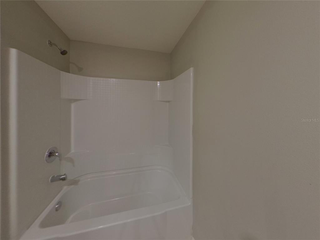 Undisclosed Address Ruskin, FL 33570 - Photo 17 of 18 a close up of a bathtub