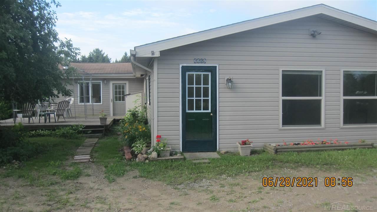 6669 Lakeshore Road Lexington, MI 48450 - Photo 1 of 26