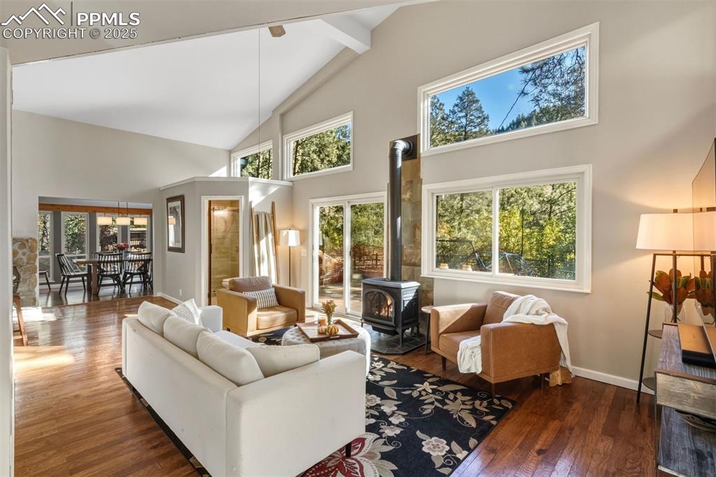 1144 Rock Creek Canyon Road, Unit A Colorado Springs, CO 80926 - Photo 12 of 50 a living room with furniture and a large window