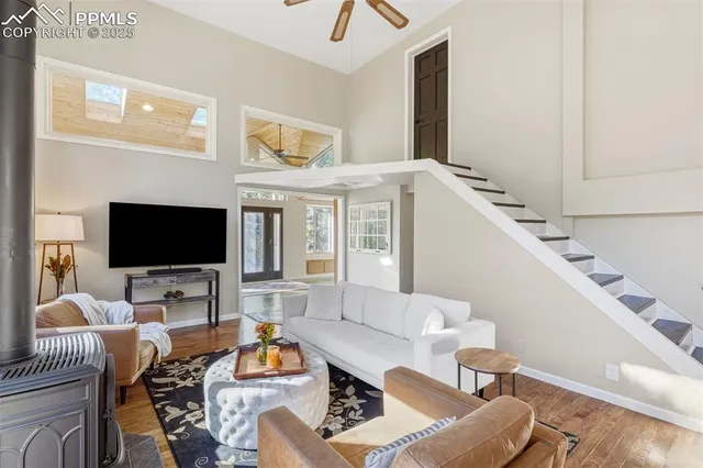 a large kitchen with a table and chairs