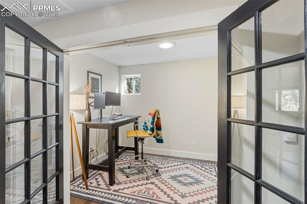 1144 Rock Creek Canyon Road, Unit A Colorado Springs, CO 80926 - Photo 20 of 50 a room with furniture and a window