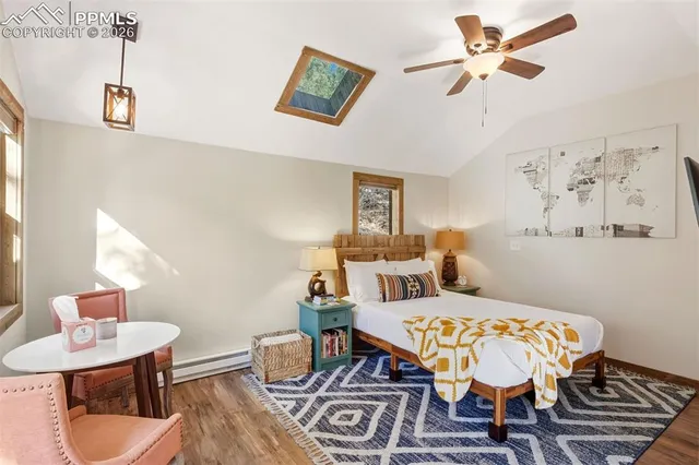 a view of balcony with wooden floor and fence