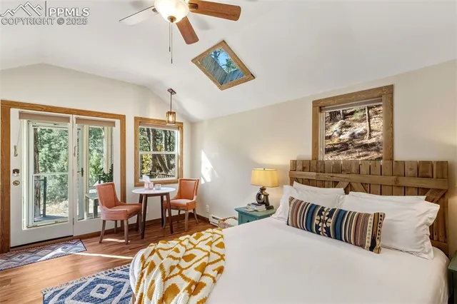 a bathroom with a sink vanity mirror and toilet