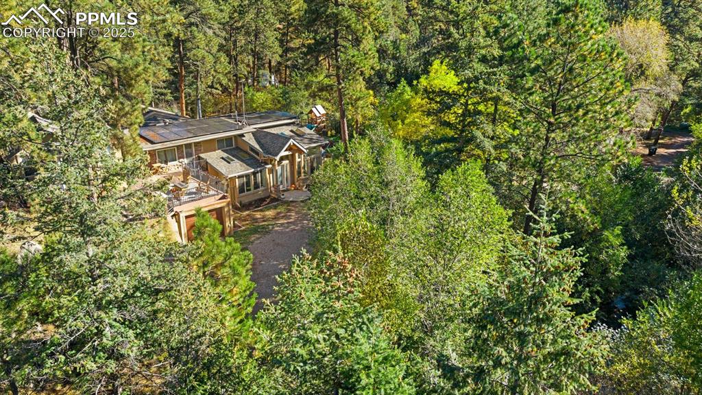 1144 Rock Creek Canyon Road, Unit A Colorado Springs, CO 80926 - Photo 49 of 50 an aerial view of a house with a yard