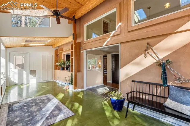 a workspace with furniture and window