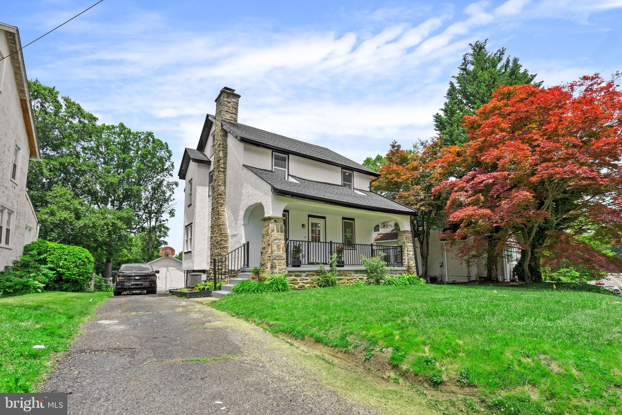 1082 Edge Hill Road Abington, PA 19001 - Photo 2 of 37 a front view of house with garden