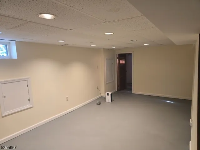 an empty room with a hallway