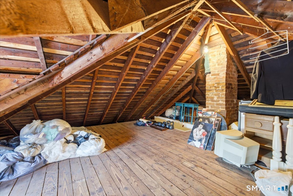 93 Cannon Street Hamden, CT 06518 - Photo 25 of 38 a view of a deck with wooden floor and seating space