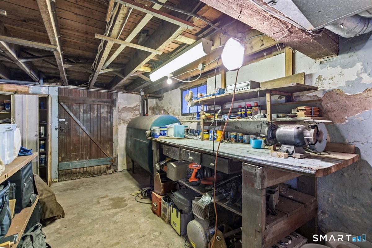 93 Cannon Street Hamden, CT 06518 - Photo 26 of 38 a view of store room with washer and dryer
