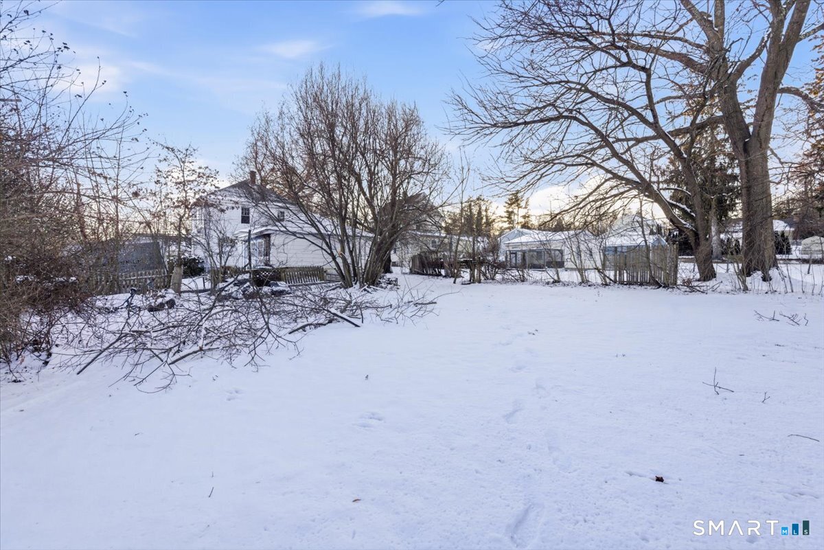 93 Cannon Street Hamden, CT 06518 - Photo 36 of 38 a street view covered with snow