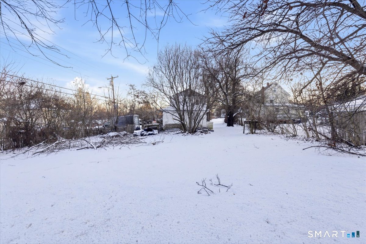 93 Cannon Street Hamden, CT 06518 - Photo 37 of 38 a view of a covered with snow in the yard