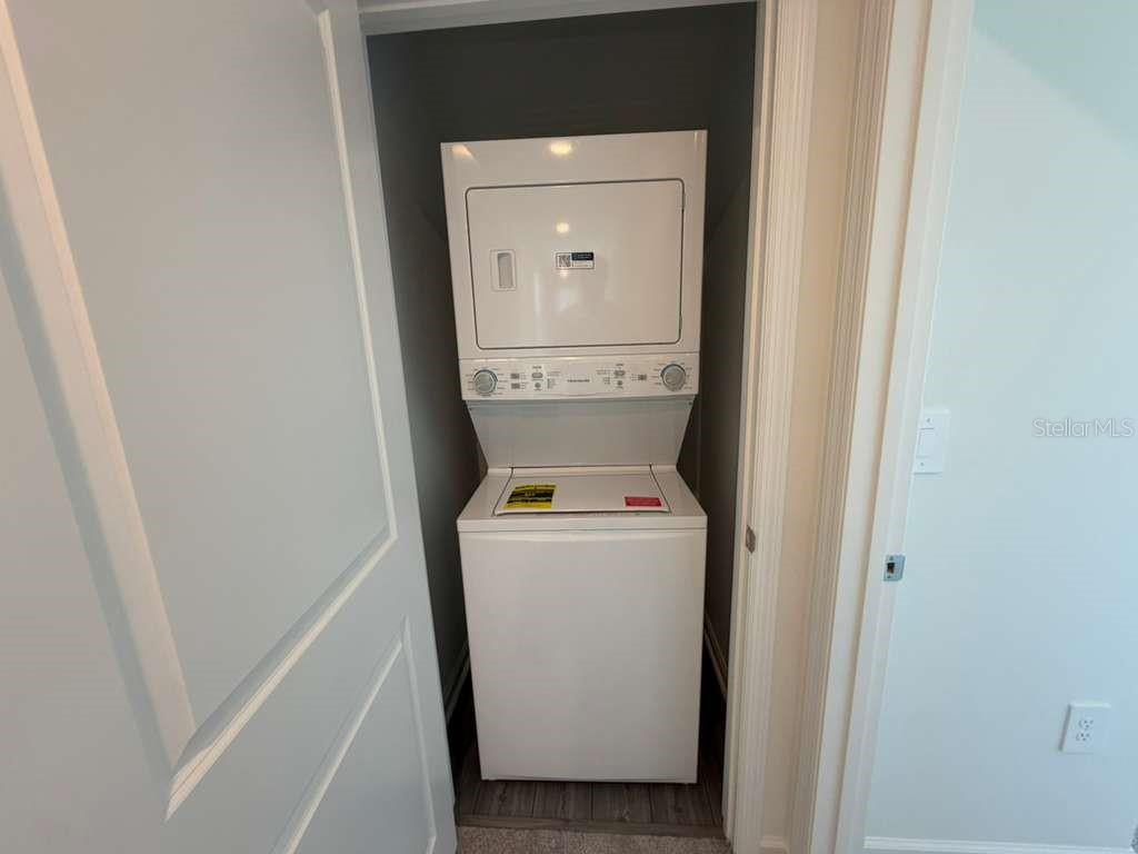 7194 Southwest 91st Lane Ocala, FL 34476 - Photo 4 of 20 a utility room with dryer and washer