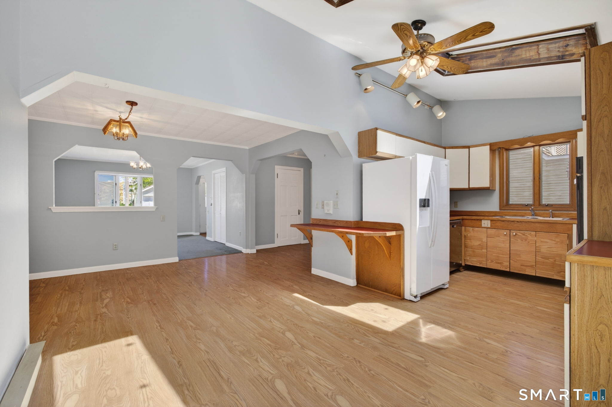 19 High Street Groton, CT 06340 - Photo 15 of 38 a view of a kitchen with furniture and windows