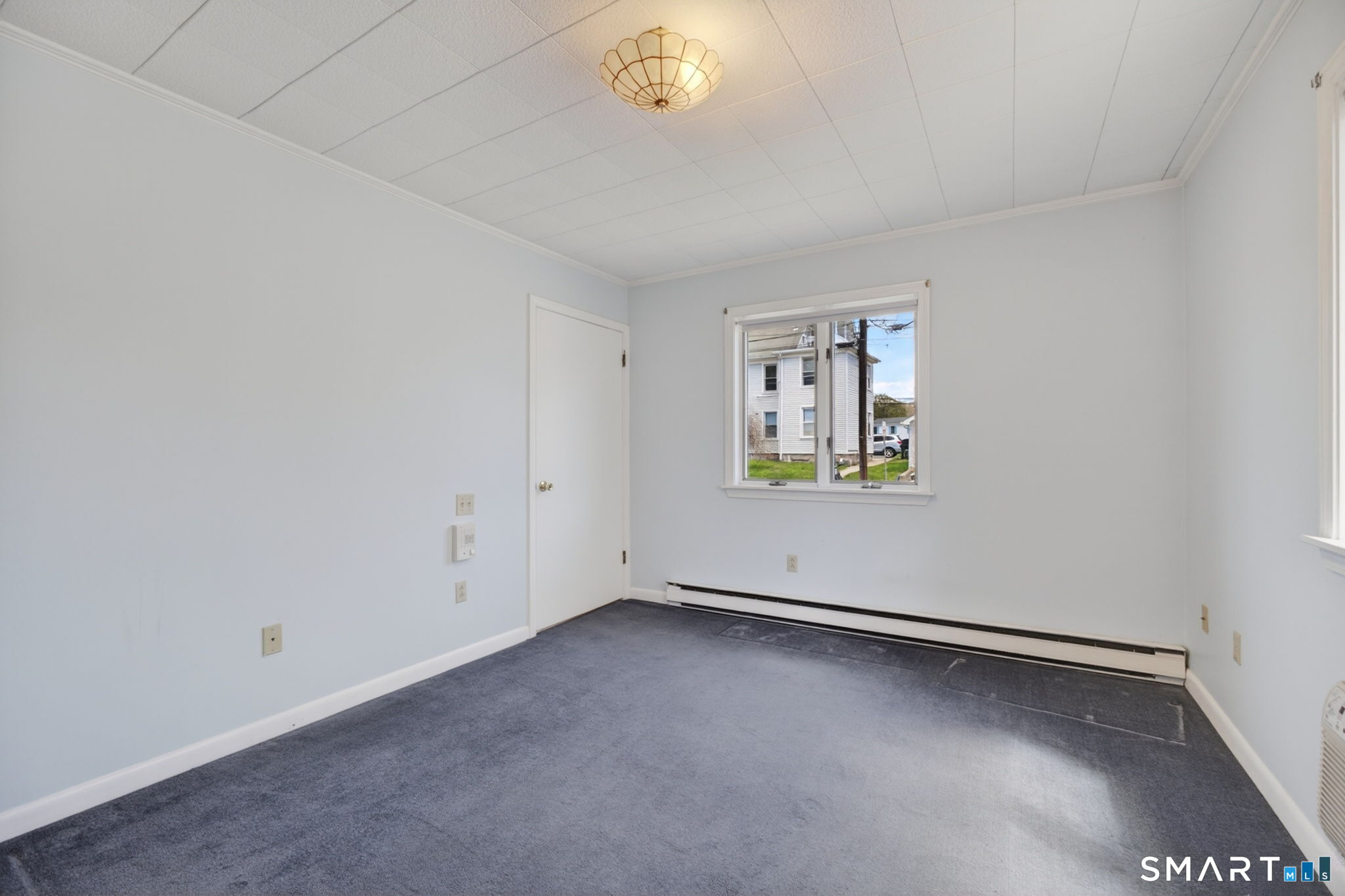 19 High Street Groton, CT 06340 - Photo 17 of 38 an empty room with a window