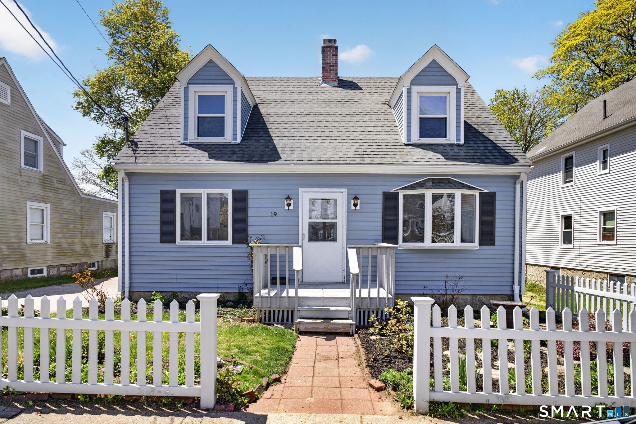 19 High Street Groton, CT 06340 - Photo 2 of 38 a front view of a house with a yard