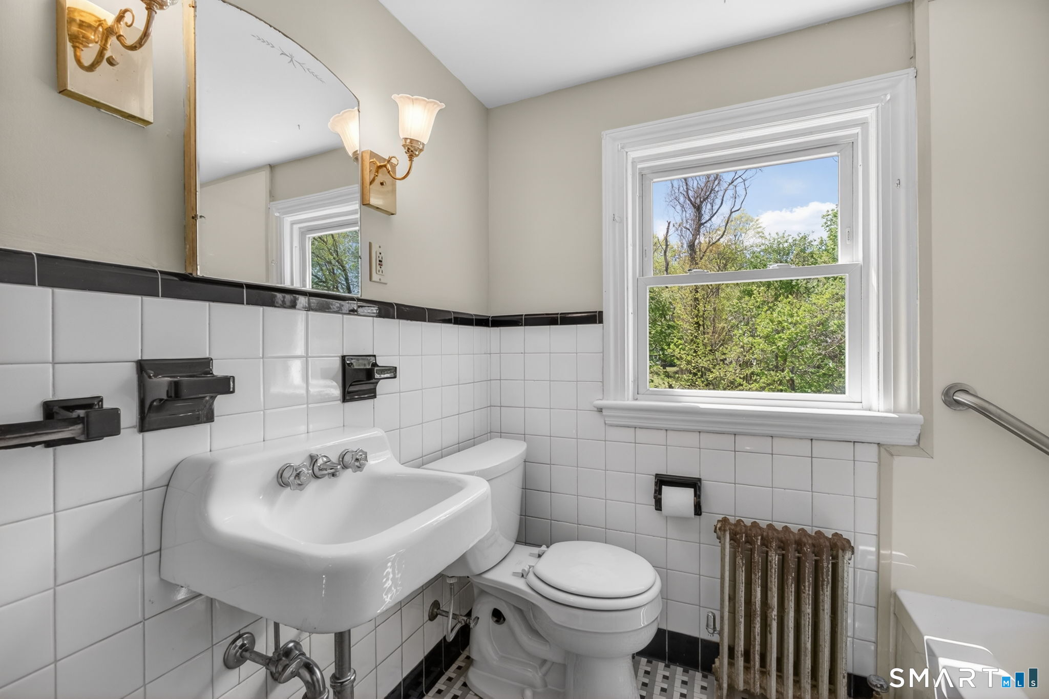 19 High Street Groton, CT 06340 - Photo 24 of 38 a bathroom with a sink toilet and a mirror