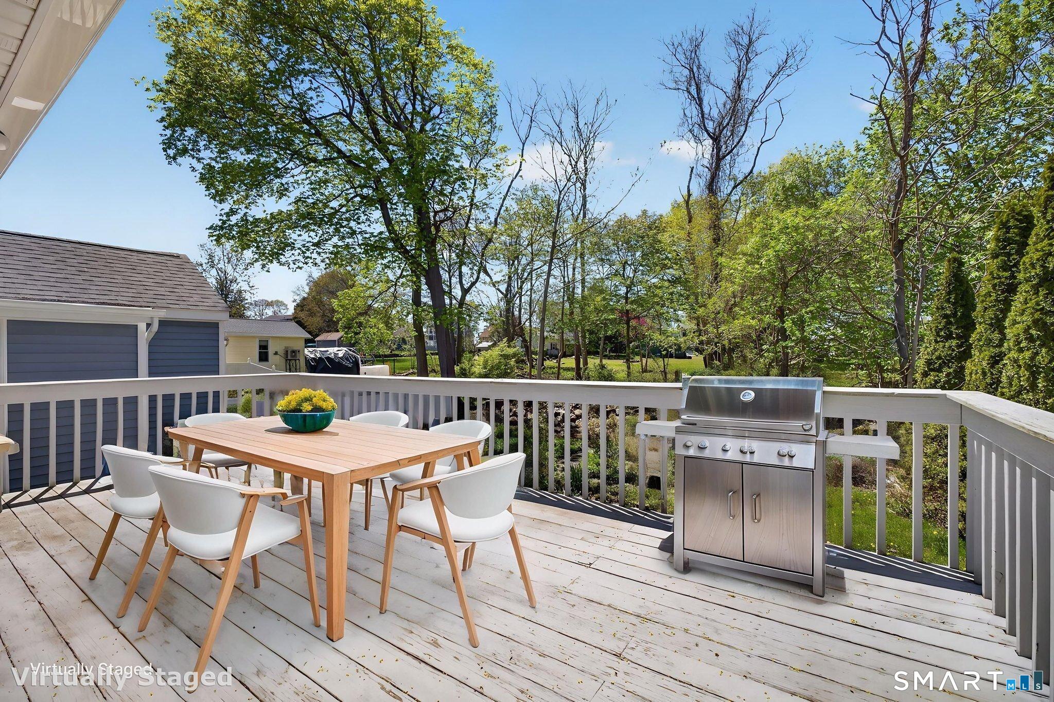 19 High Street Groton, CT 06340 - Photo 29 of 38 a view of roof deck with furniture and trees