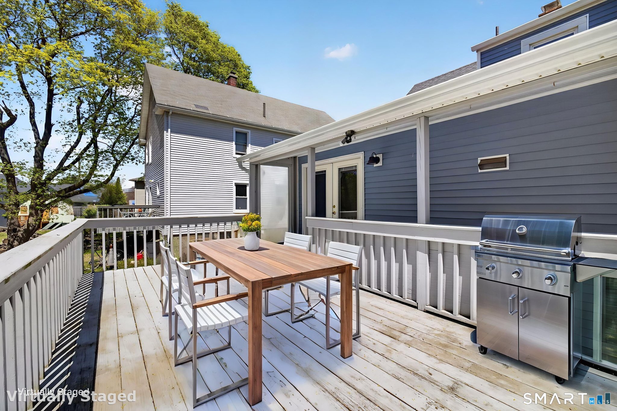 19 High Street Groton, CT 06340 - Photo 31 of 38 a view of a deck with furniture and trees