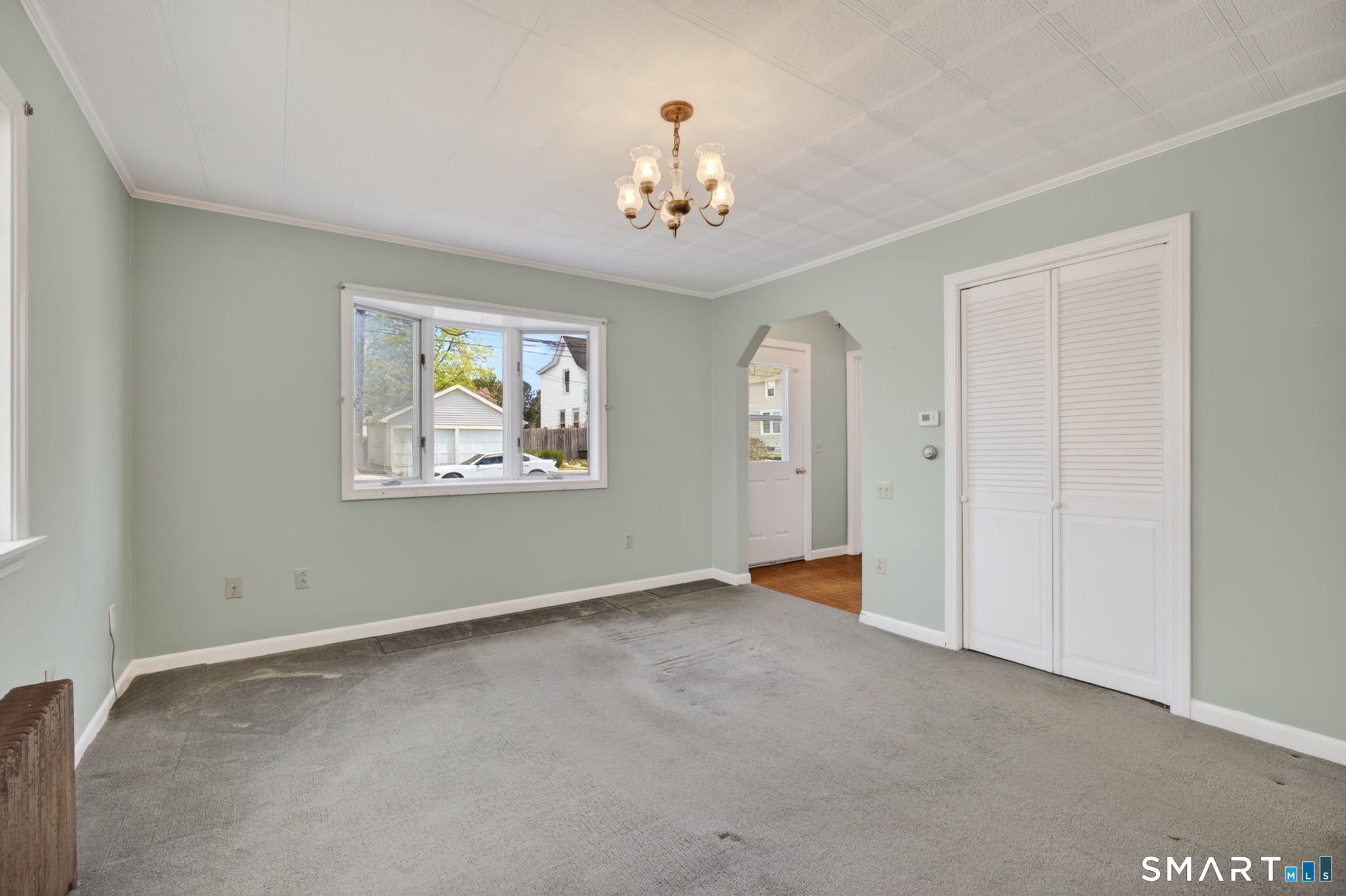 19 High Street Groton, CT 06340 - Photo 6 of 38 a view of an empty room with a window