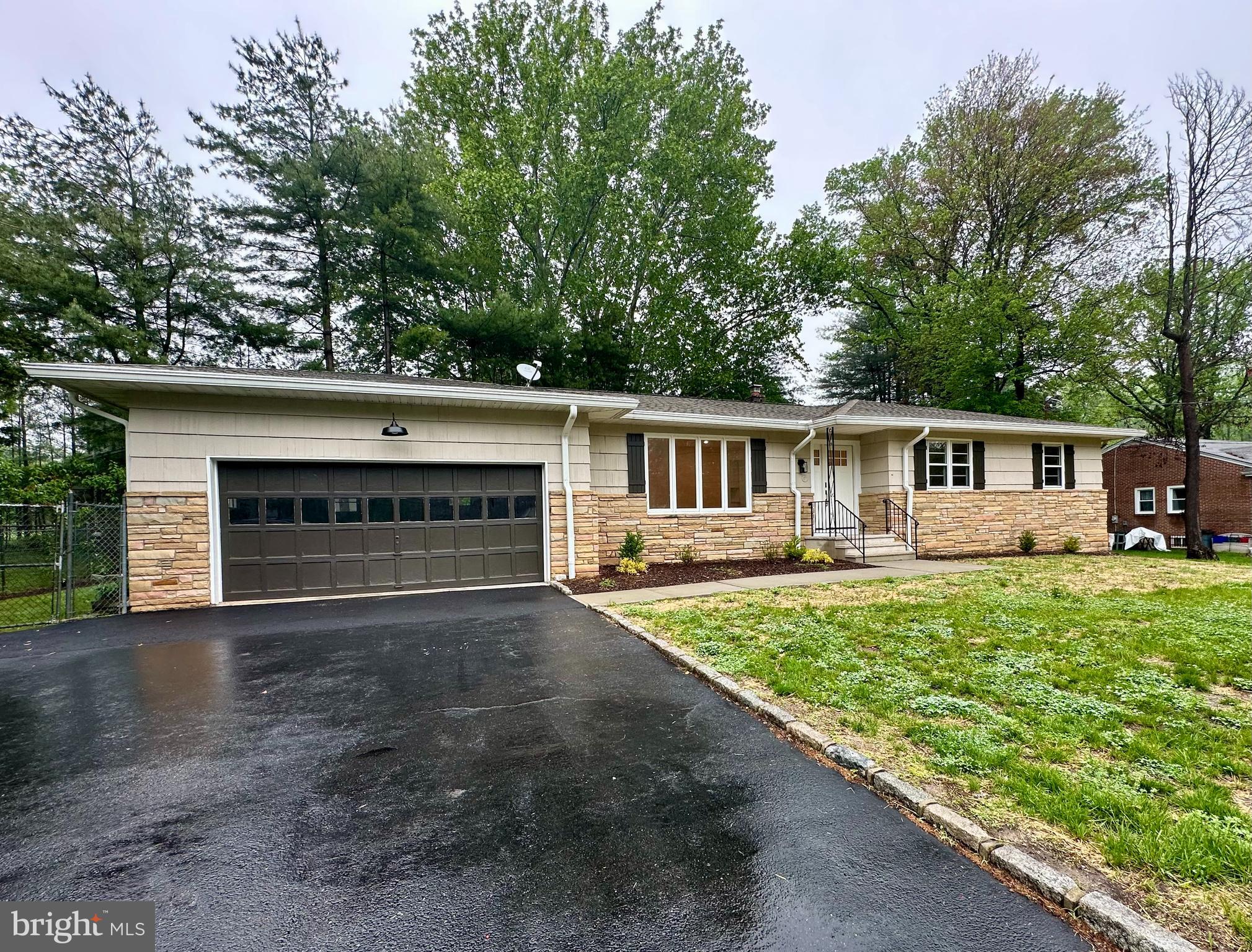 36 Bull Run Road Pennington, NJ 08534 - Photo 1 of 1 a front view of a house with yard and green space