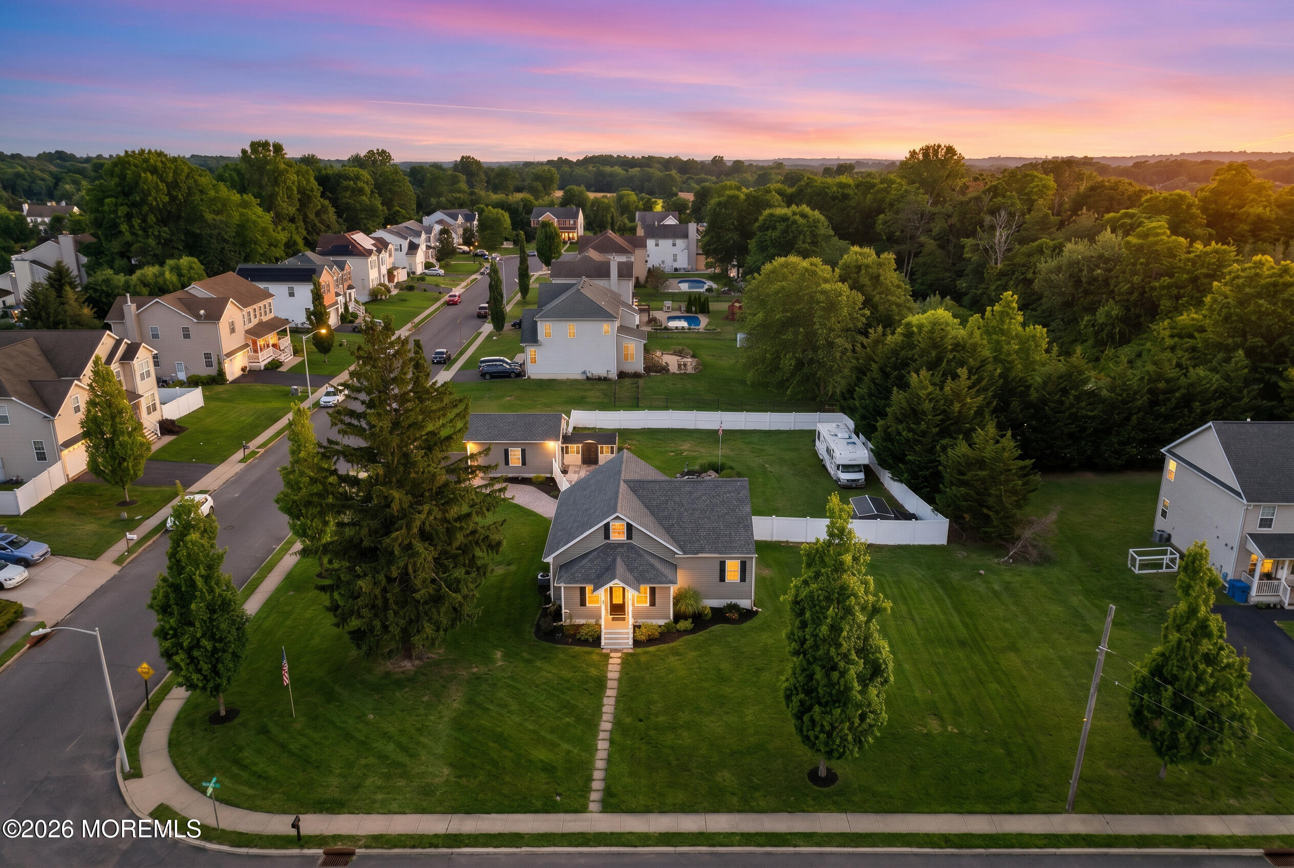 181 Locust Avenue Howell, NJ 07731 - Photo 1 of 66 an aerial view of residential houses with outdoor space and trees