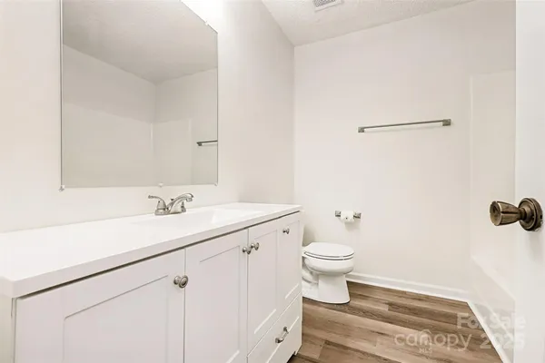 a bathroom with a sink and a toilet