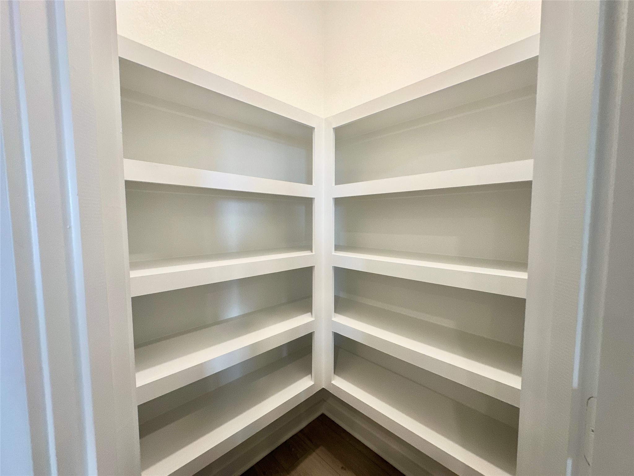 12324 Ridge Top Drive Conroe, TX 77304 - Photo 5 of 25 a view of walk in closet with empty racks