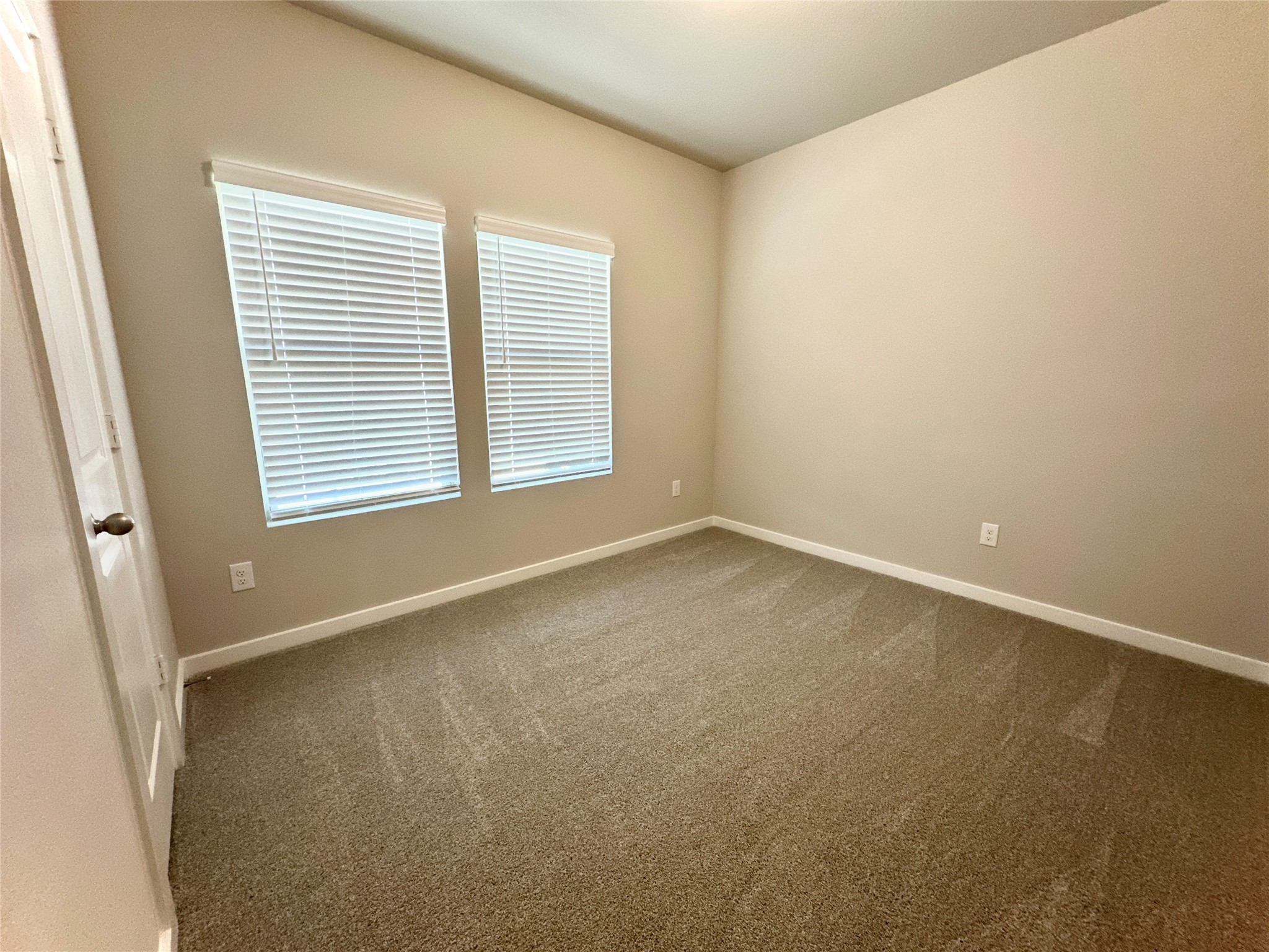 12324 Ridge Top Drive Conroe, TX 77304 - Photo 6 of 25 an empty room with a window