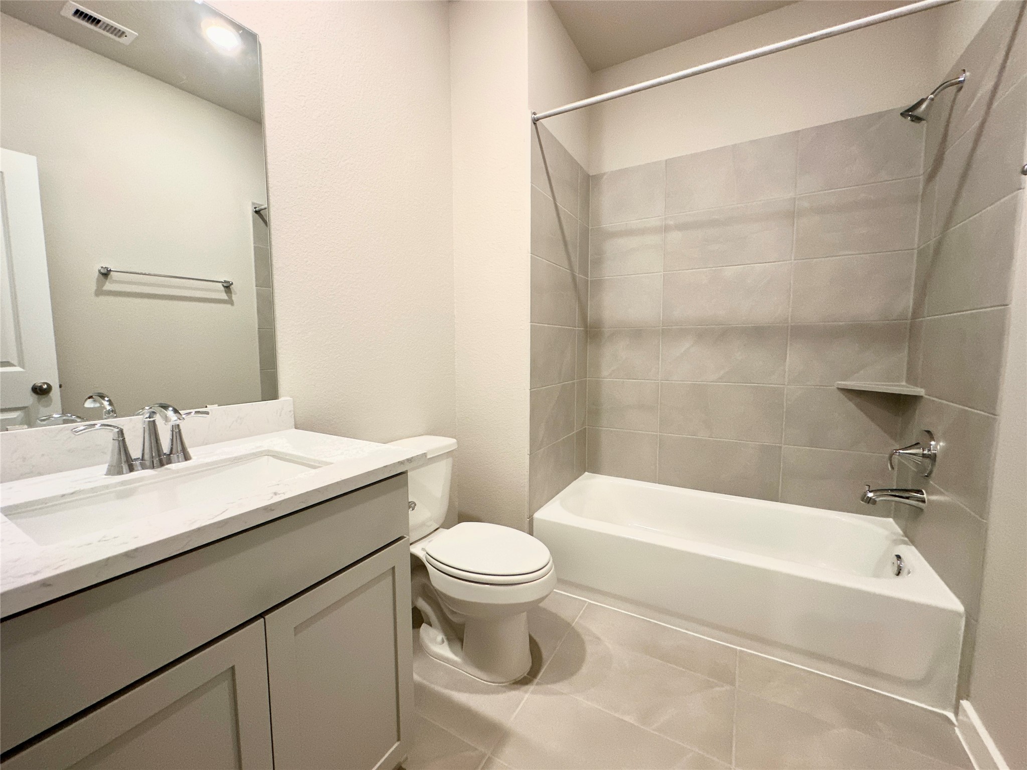 12324 Ridge Top Drive Conroe, TX 77304 - Photo 7 of 25 a bathroom with a sink a toilet and a bathtub