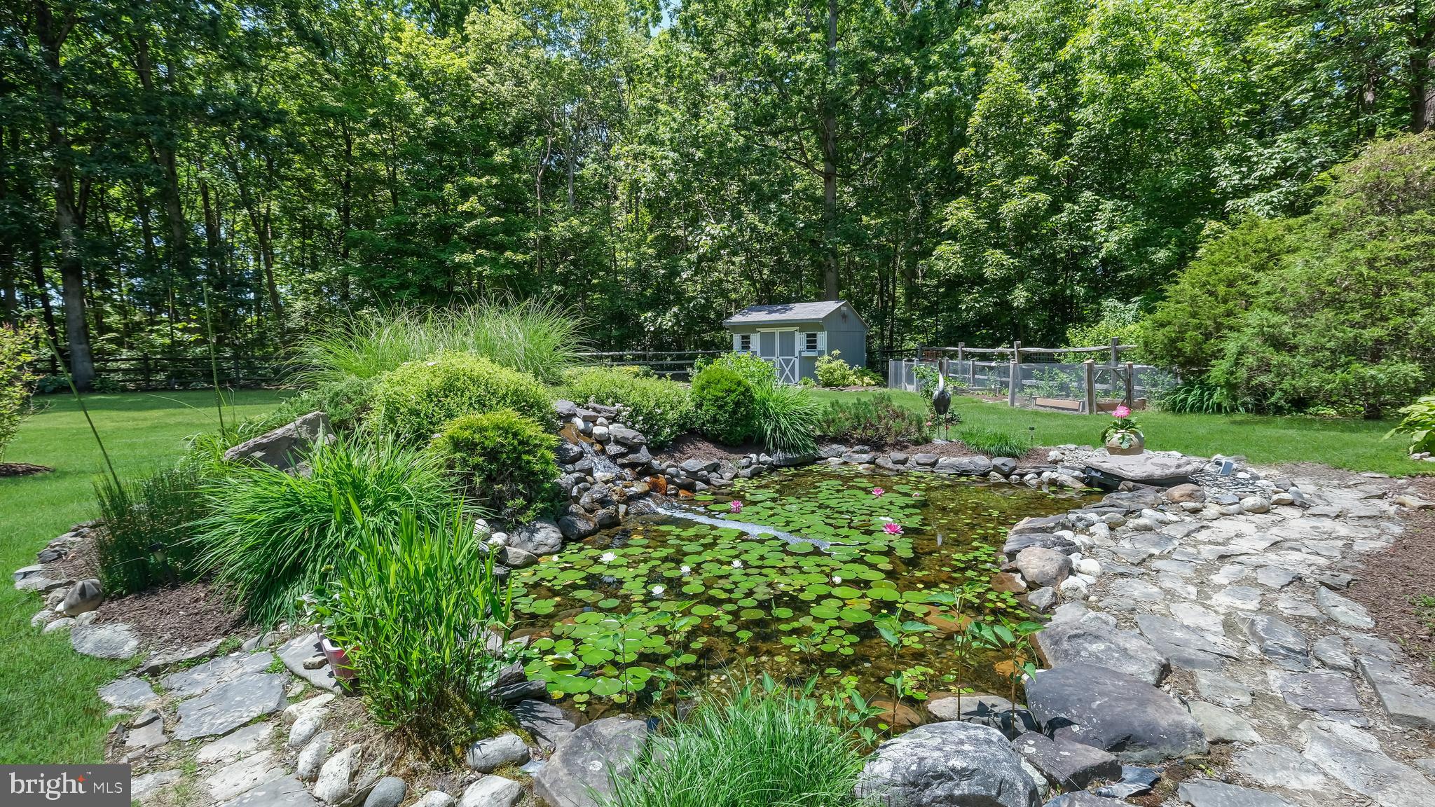 1368 Slotter Road Perkasie, PA 18944 - Photo 44 of 57 small pond with waterfall