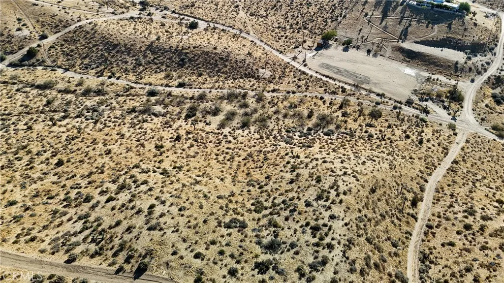 750 Ocotillo Way Apple Valley, CA 92308 - Photo 9 of 11 Red boundary lines on pictures are an estimate and for marketing purposes only. Buyer to verify all aspects of this property including, but not limited to utilities, assessments, boundaries, usage, access, and zoning to satisfy themselves.