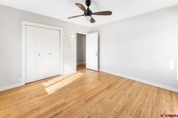 a view of washer and dryer with wooden floor