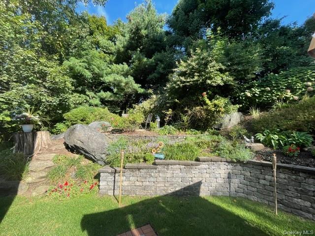 145 Shore Road Manhasset, NY 11030 - Photo 12 of 23 a view of a backyard