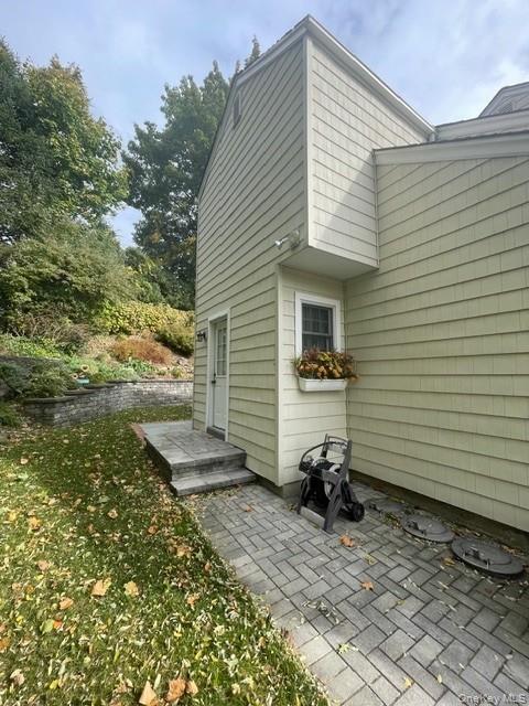 145 Shore Road Manhasset, NY 11030 - Photo 5 of 23 a view of a back yard of the house