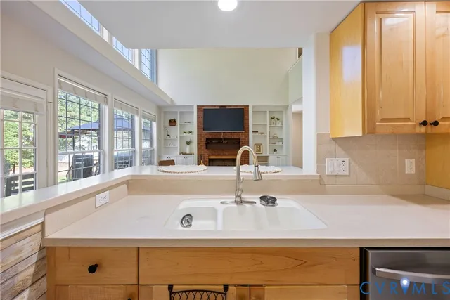 a bathroom with a sink and a large mirror